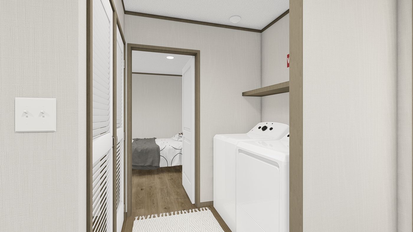 The HUDSON Utility Room. This Manufactured Mobile Home features 3 bedrooms and 2 baths.