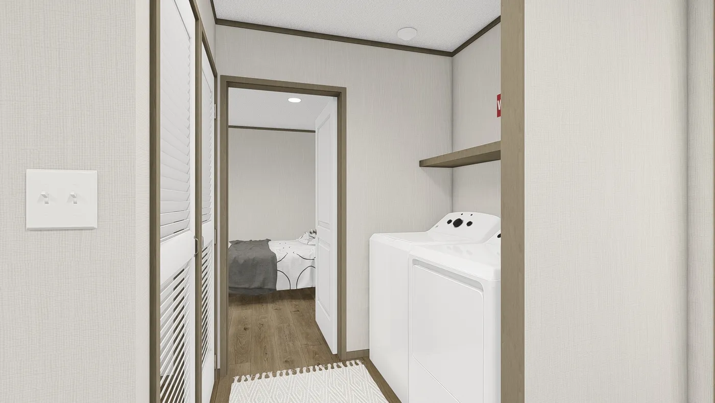 The HUDSON Utility Room. This Manufactured Mobile Home features 3 bedrooms and 2 baths.