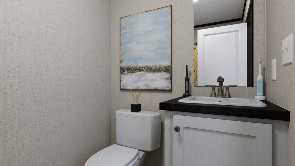 The RALLY Guest Bathroom. This Manufactured Mobile Home features 3 bedrooms and 2 baths.
