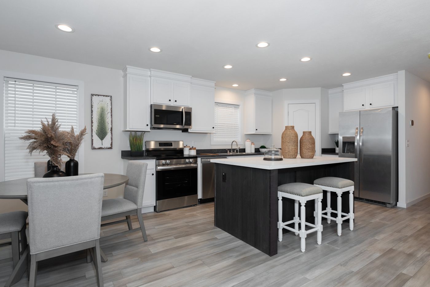 The CENTER ST/5228-MS014-1 SECT Kitchen. This Manufactured Mobile Home features 3 bedrooms and 2 baths.