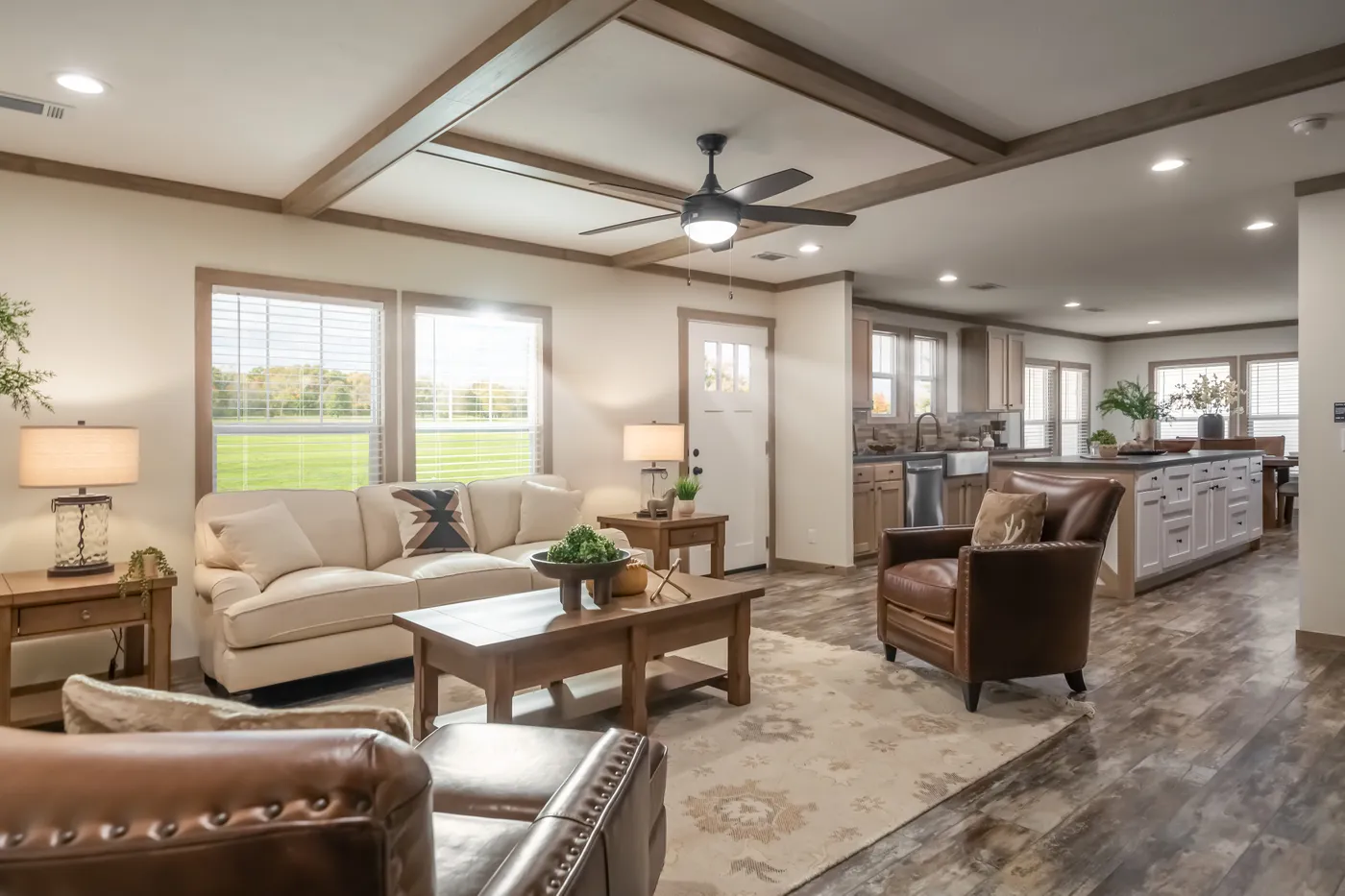 The BOUJEE PREMIER Living Room. This Manufactured Mobile Home features 4 bedrooms and 2 baths.