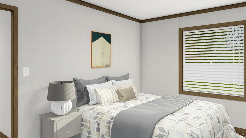 The HOMESTEAD BREEZE Bedroom. This Manufactured Mobile Home features 4 bedrooms and 2 baths.