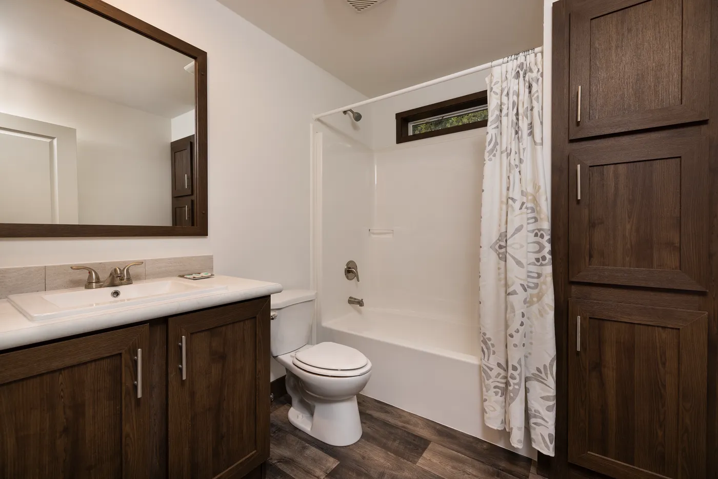 The RAMSEY 75 Guest Bathroom. This Manufactured Mobile Home features 4 bedrooms and 2 baths.