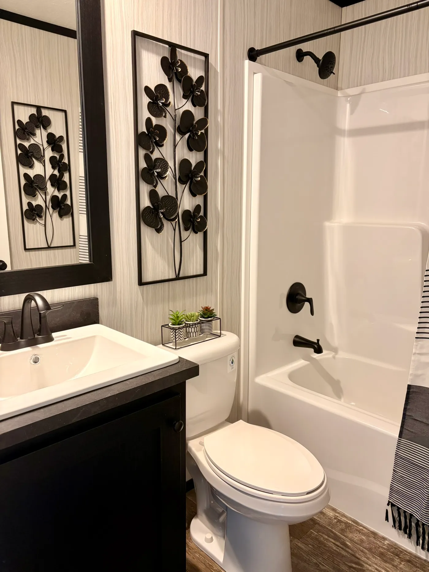 The PEARL Guest Bathroom. This Manufactured Mobile Home features 3 bedrooms and 2 baths.