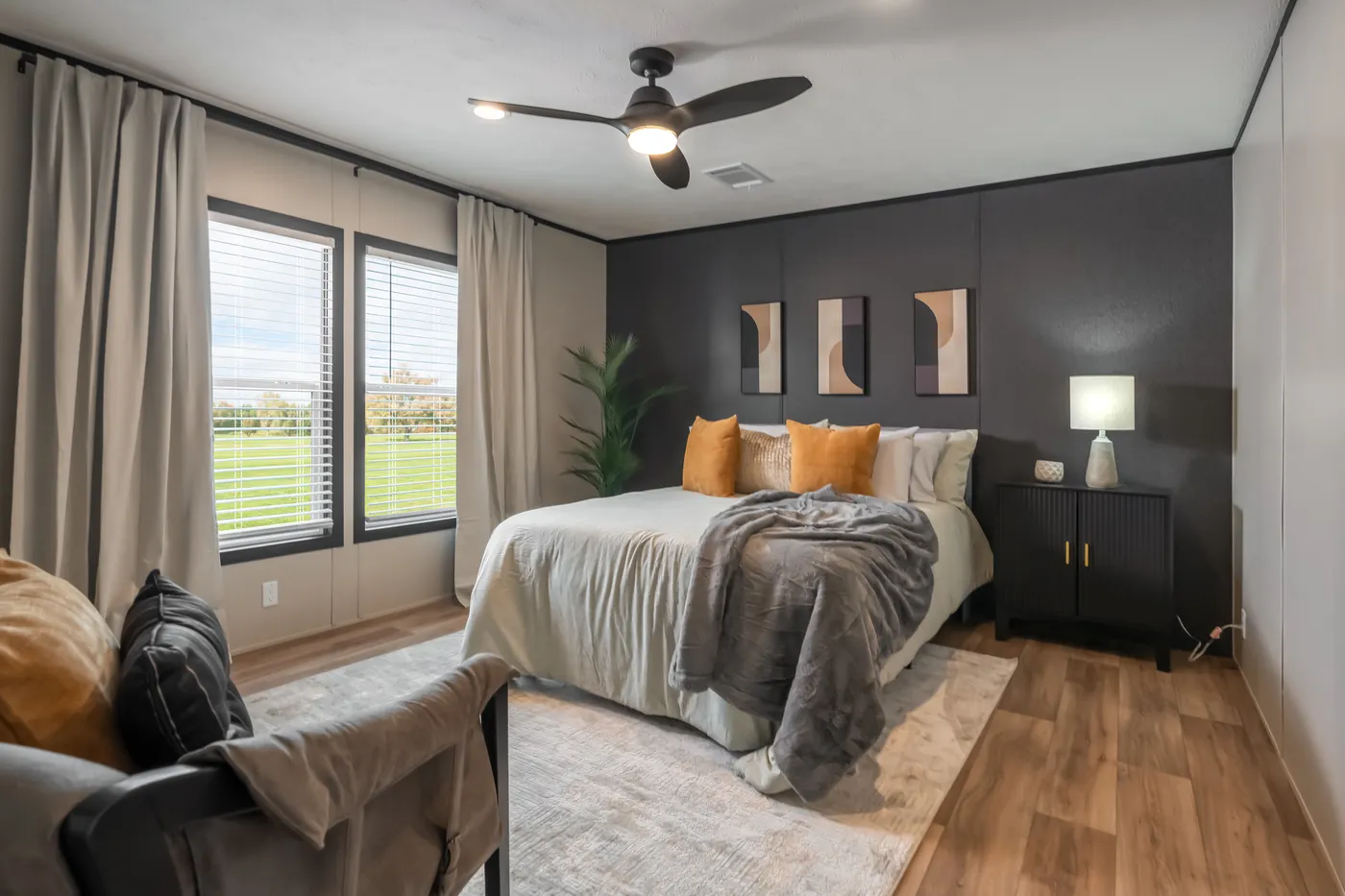 The THE ANNIVERSARY 2.1 Primary Bedroom. This Manufactured Mobile Home features 3 bedrooms and 2 baths.