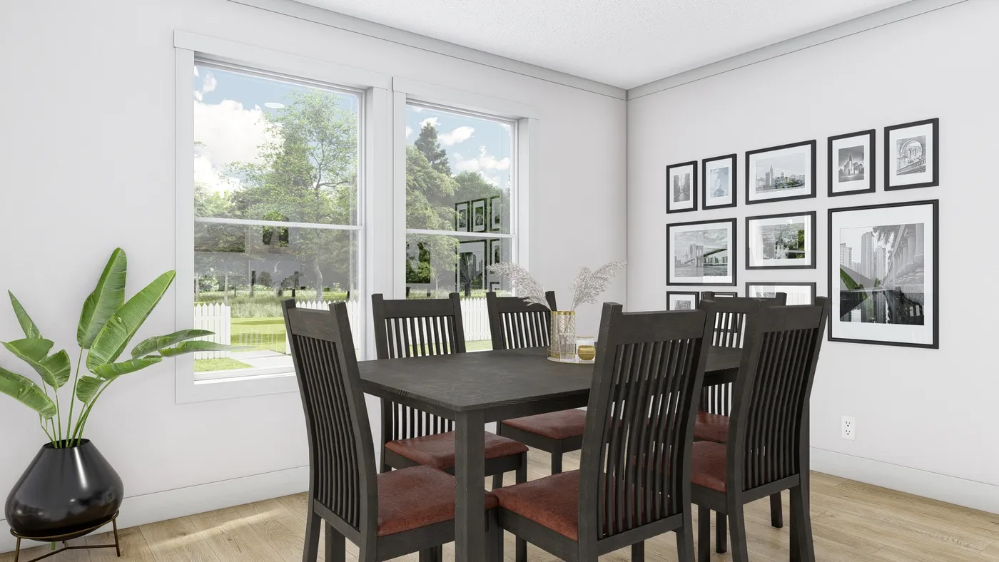 The JOHNNY B GOODE Dining Room. This Manufactured Mobile Home features 3 bedrooms and 2 baths.