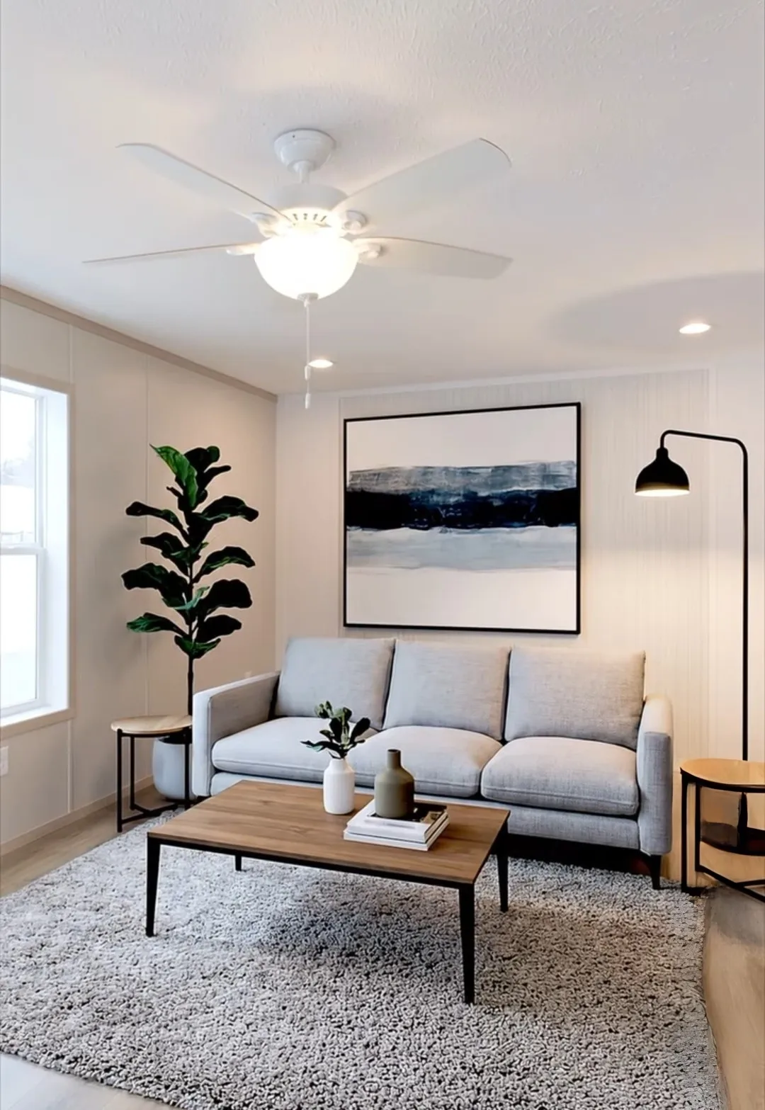 The TURQUOISE Living Room. This Manufactured Mobile Home features 2 bedrooms and 2 baths.