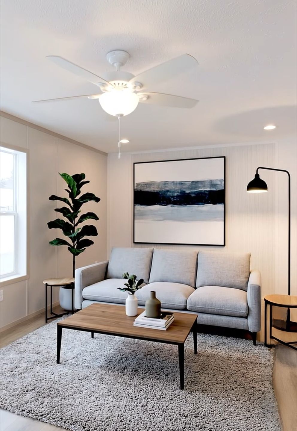 The TURQUOISE Living Room. This Manufactured Mobile Home features 2 bedrooms and 2 baths.