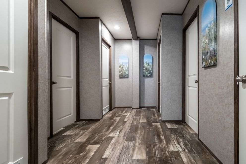 The LOCKLEAR Exterior. This Manufactured Mobile Home features 4 bedrooms and 2 baths.