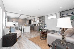 The PLATINUM ANNIVERSARY Living Room. This Manufactured Mobile Home features 3 bedrooms and 2 baths.