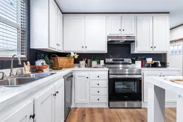 The SELECT 16723I Kitchen. This Manufactured Mobile Home features 3 bedrooms and 2 baths.