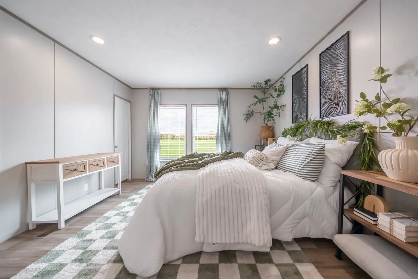 The VISTA Primary Bedroom. This Manufactured Mobile Home features 3 bedrooms and 2 baths.
