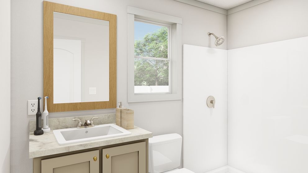 The GOOD VIBRATIONS 6614 TEMPO Primary Bathroom. This Manufactured Mobile Home features 3 bedrooms and 2 baths.