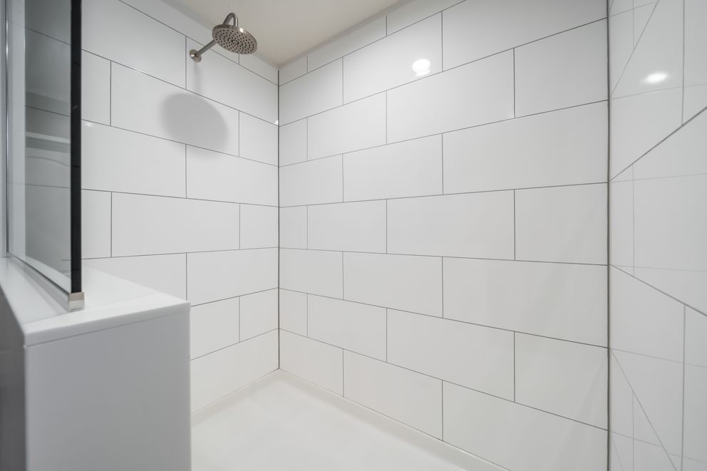 The ISLAND BREEZE 64 Primary Bathroom. This Manufactured Mobile Home features 4 bedrooms and 2 baths.