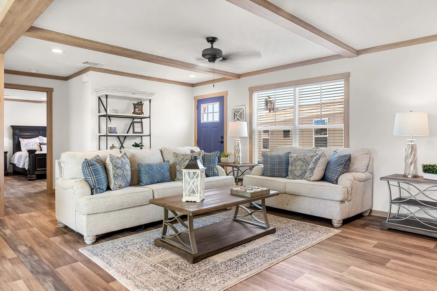 The LIZZIE Living Room. This Manufactured Mobile Home features 3 bedrooms and 2 baths.