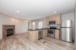 The BLAZER 48 A Kitchen. This Manufactured Mobile Home features 2 bedrooms and 1 bath.
