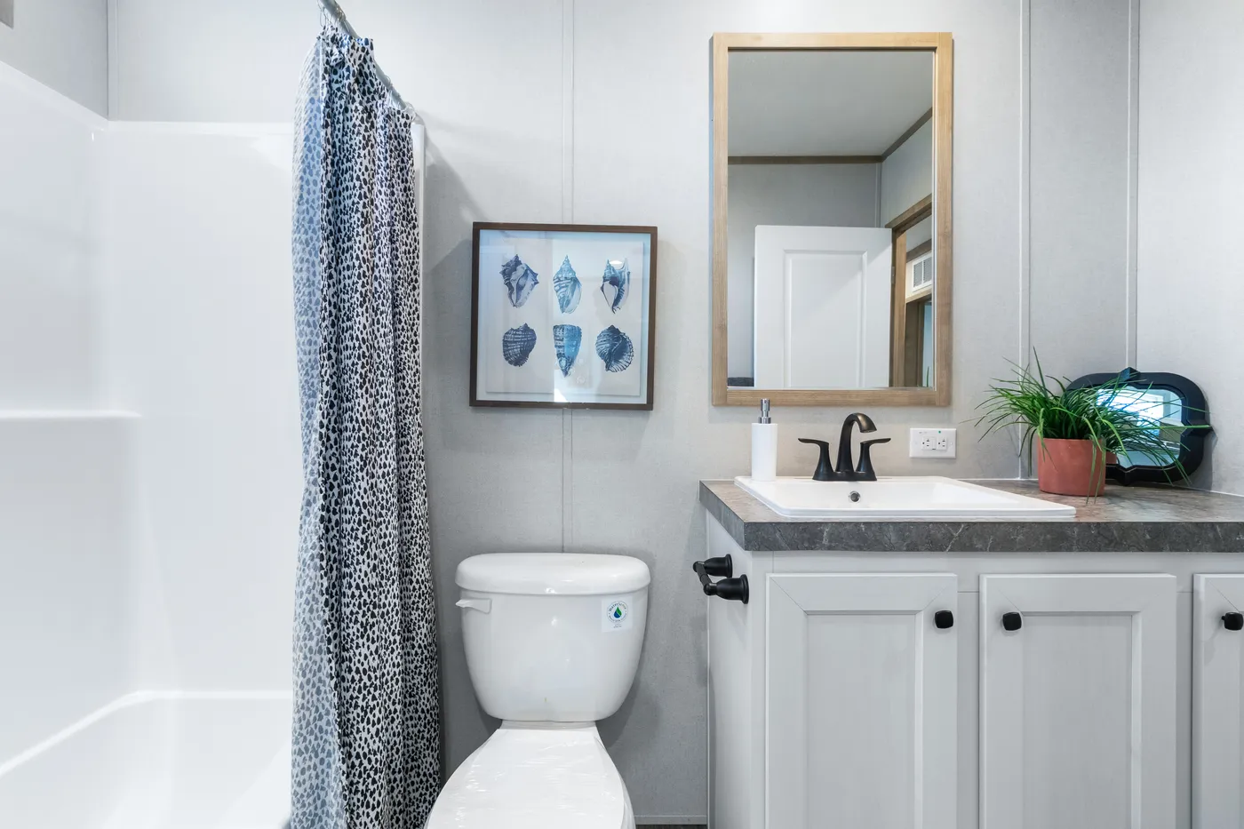 The PT 78 Guest Bathroom. This Manufactured Mobile Home features 3 bedrooms and 2 baths.