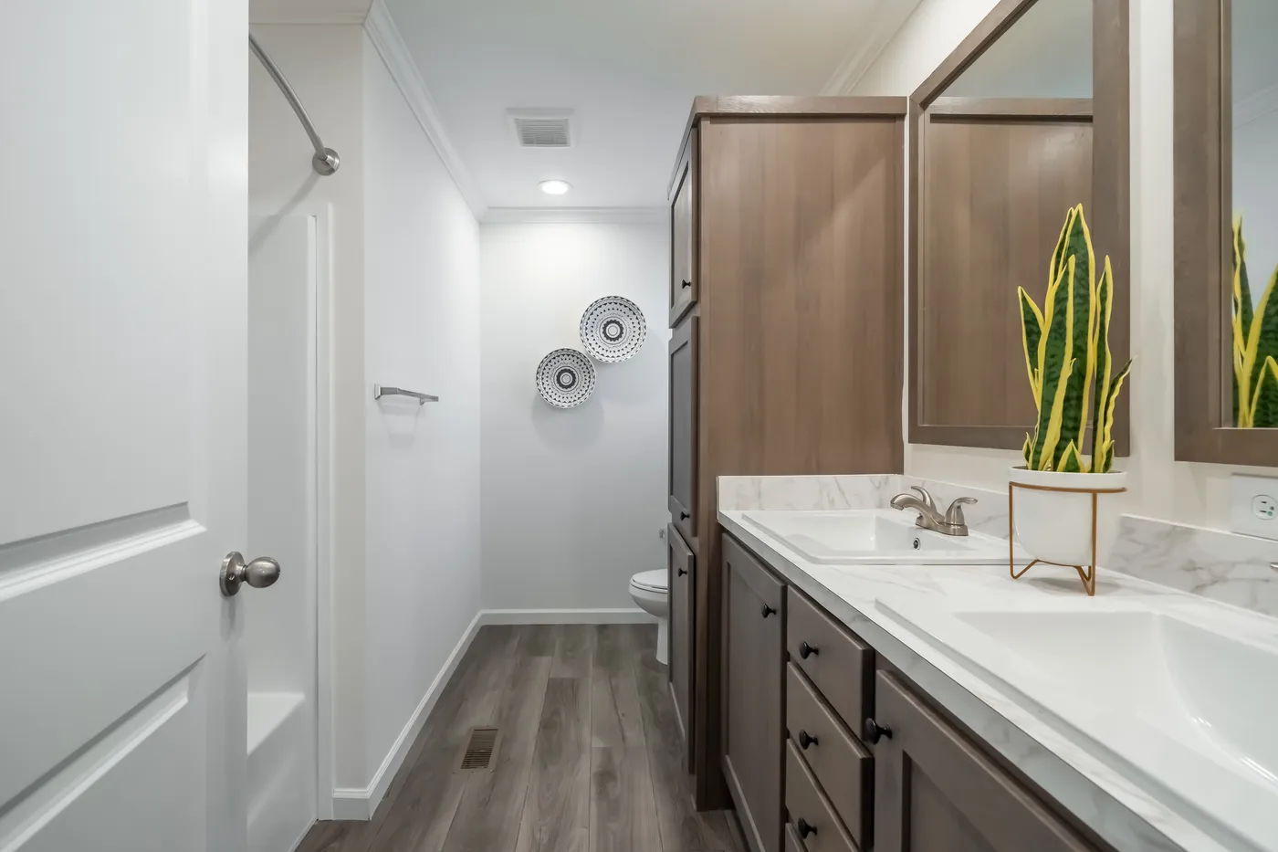 The 4200 "SOUTHPORT" 58'4X16 Primary Bathroom. This Manufactured Mobile Home features 2 bedrooms and 2 baths.