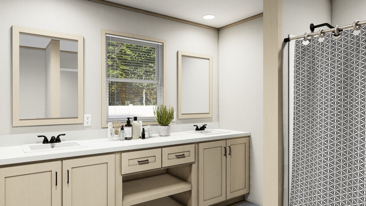 The KING AIR Guest Bathroom. This Manufactured Mobile Home features 4 bedrooms and 2 baths.