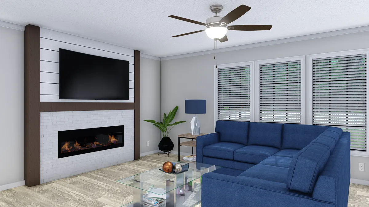 The THE BIG EASY Living Room. This Manufactured Mobile Home features 4 bedrooms and 3 baths.