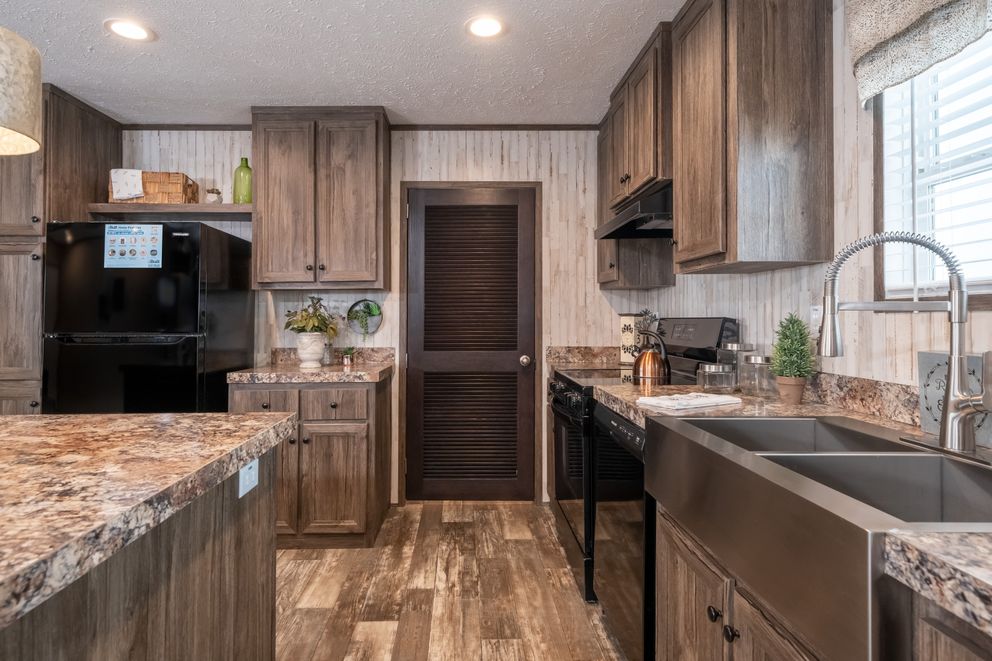 The HARDIN Kitchen. This Manufactured Mobile Home features 3 bedrooms and 2 baths.