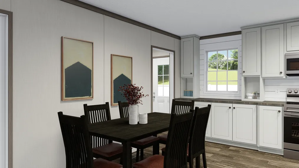 The ULTRA PRO 3 BR 28X56 Dining Area. This Manufactured Mobile Home features 3 bedrooms and 2 baths.