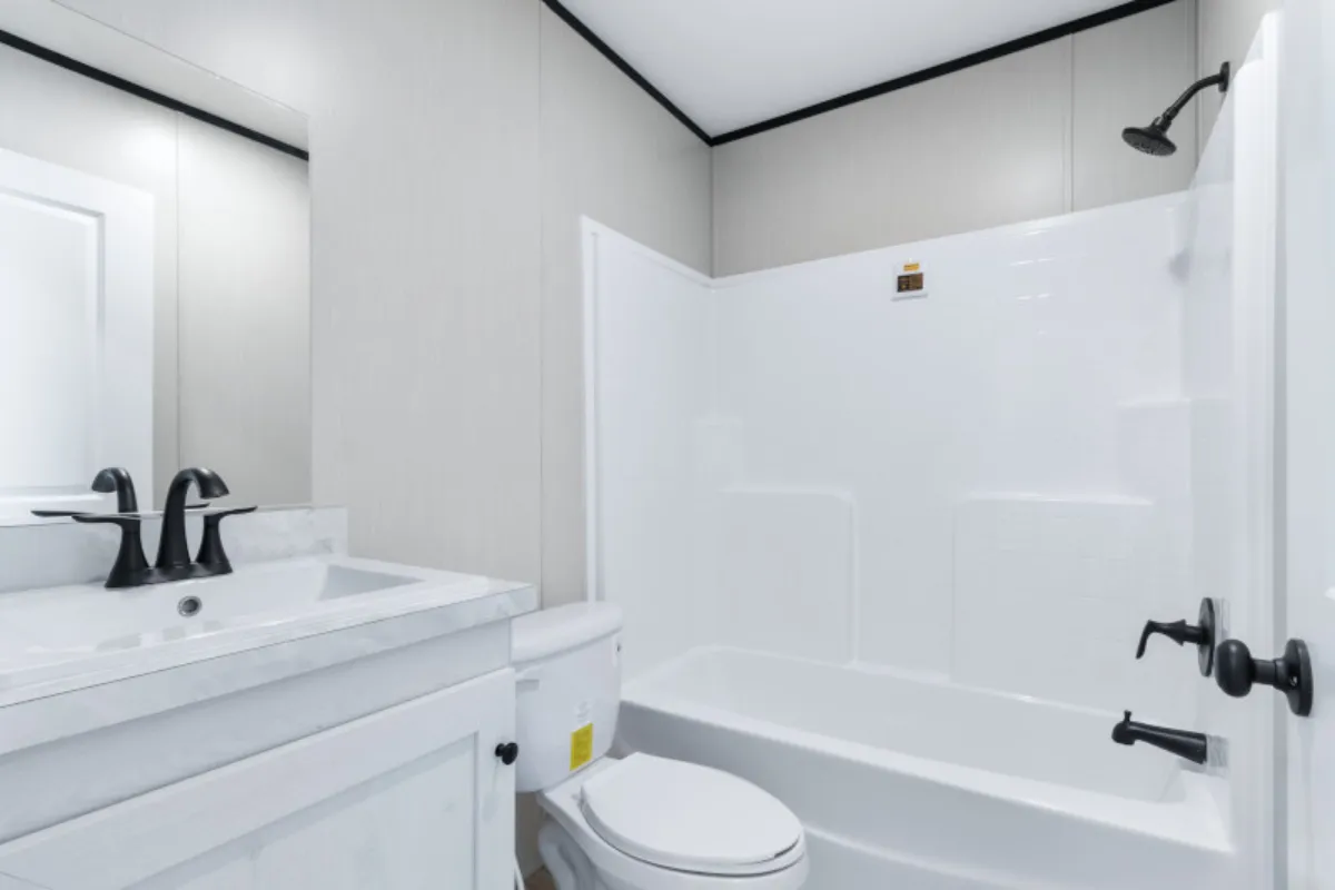 The ANNIVERSARY 16763S Kitchen. This Manufactured Mobile Home features 3 bedrooms and 2 baths.