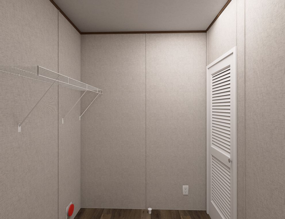 The DOGWOOD Utility Room. This Manufactured Mobile Home features 2 bedrooms and 2 baths.