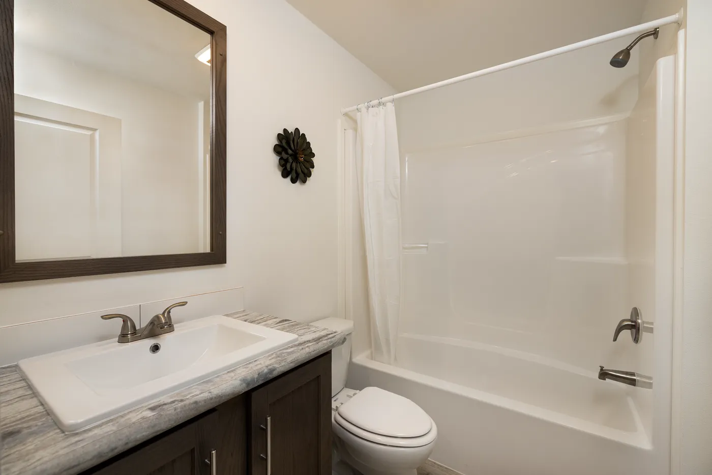 The RAMSEY 217-1 Guest Bathroom. This Manufactured Mobile Home features 3 bedrooms and 2 baths.