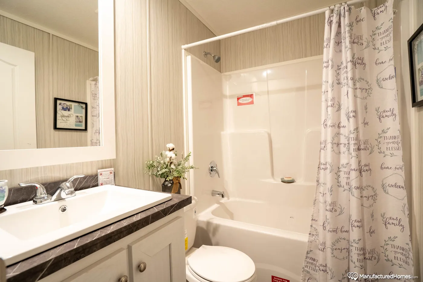 The TOPAZ 70 Guest Bathroom. This Manufactured Mobile Home features 3 bedrooms and 2 baths.