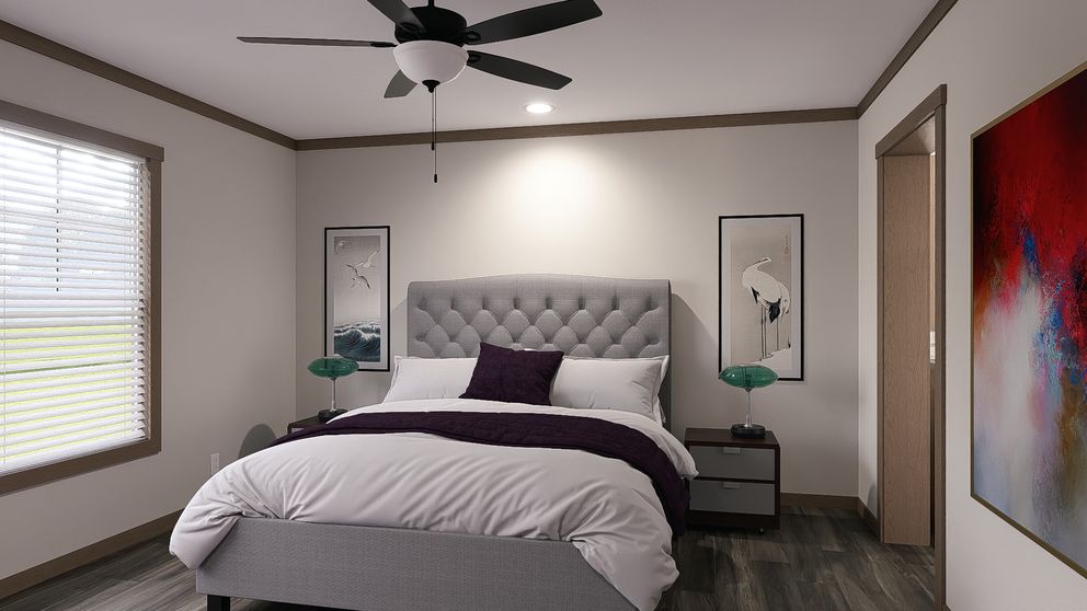 The NELLIE Primary Bedroom. This Manufactured Mobile Home features 4 bedrooms and 2 baths.