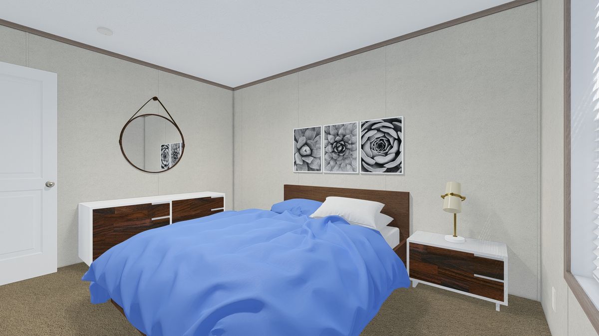 The 7228-5789 THE PULSE Guest Bedroom. This Manufactured Mobile Home features 3 bedrooms and 2 baths.