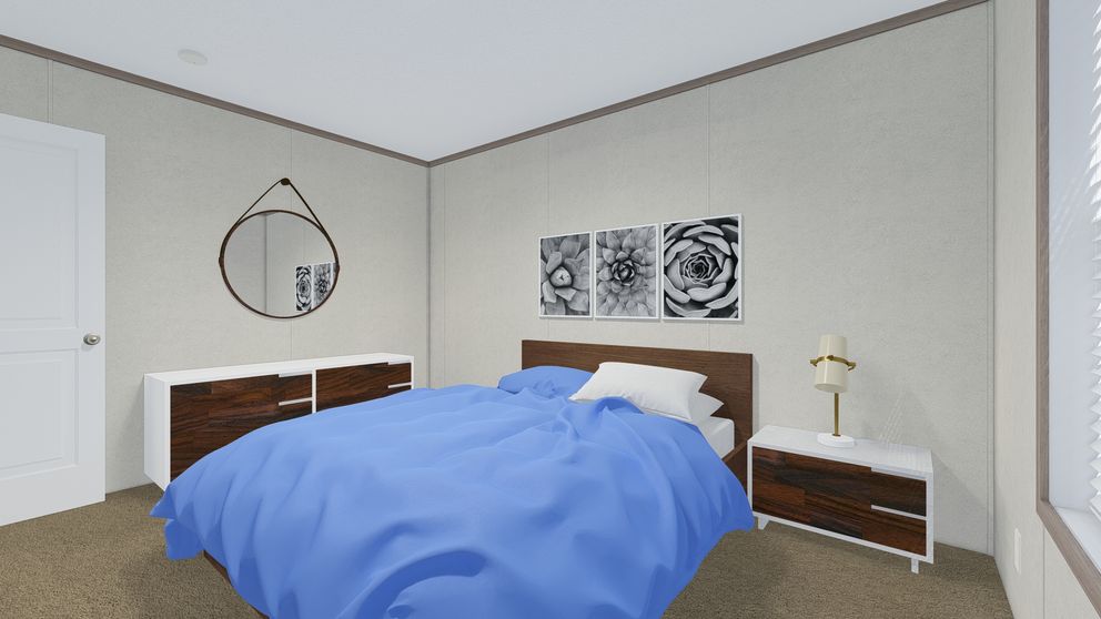 The 7228-5789 THE PULSE Guest Bedroom. This Manufactured Mobile Home features 3 bedrooms and 2 baths.