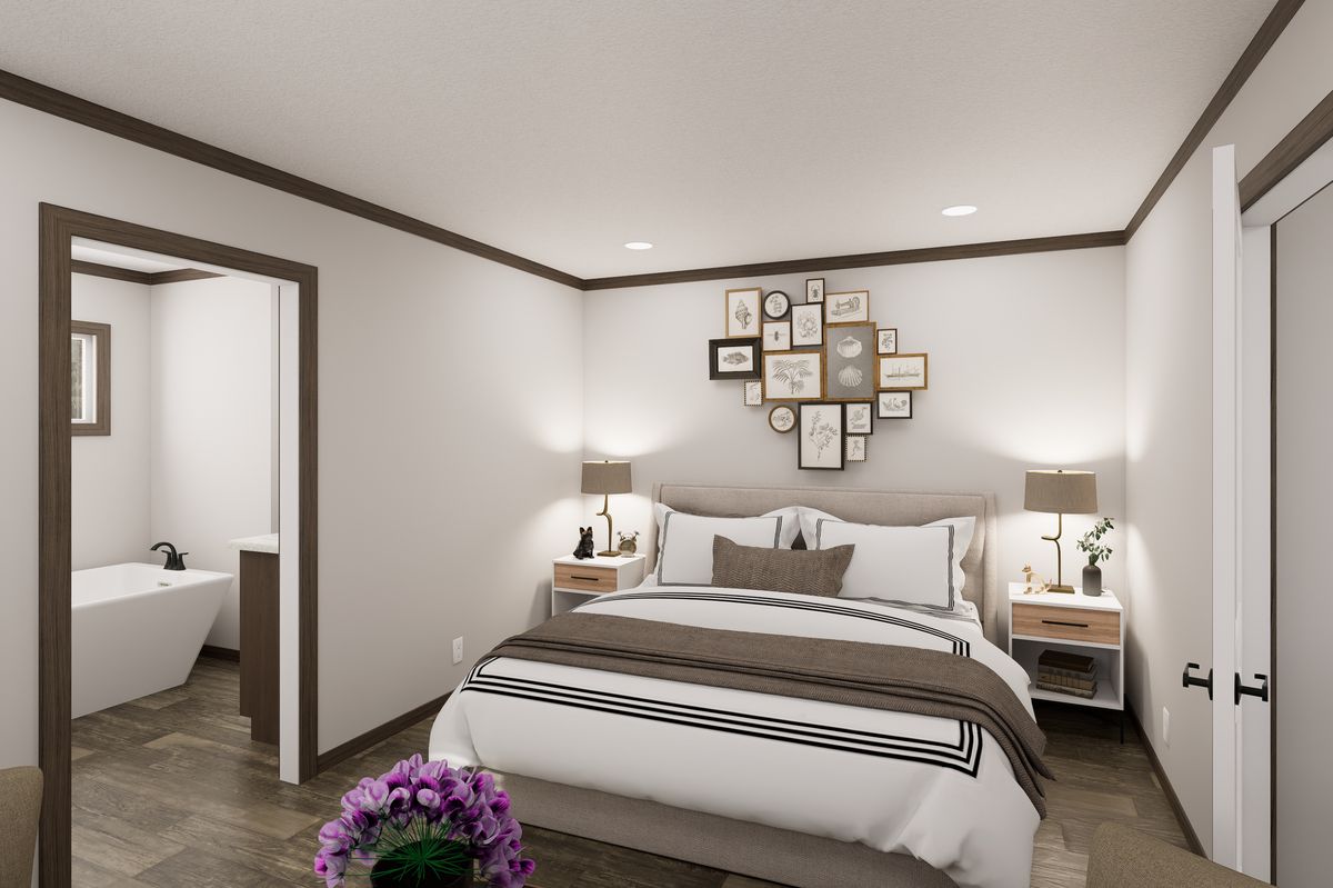The THE TRUMAN Primary Bedroom. This Manufactured Mobile Home features 3 bedrooms and 2 baths.