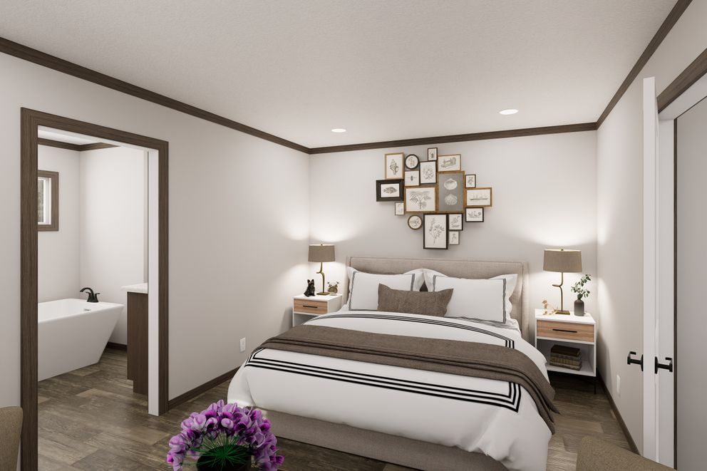 The THE TRUMAN Primary Bedroom. This Manufactured Mobile Home features 3 bedrooms and 2 baths.