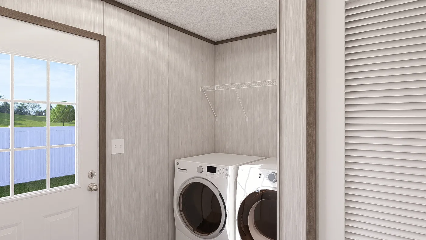 The LEGEND ANNIVERSARY 16X76 Utility Room. This Manufactured Mobile Home features 3 bedrooms and 2 baths.