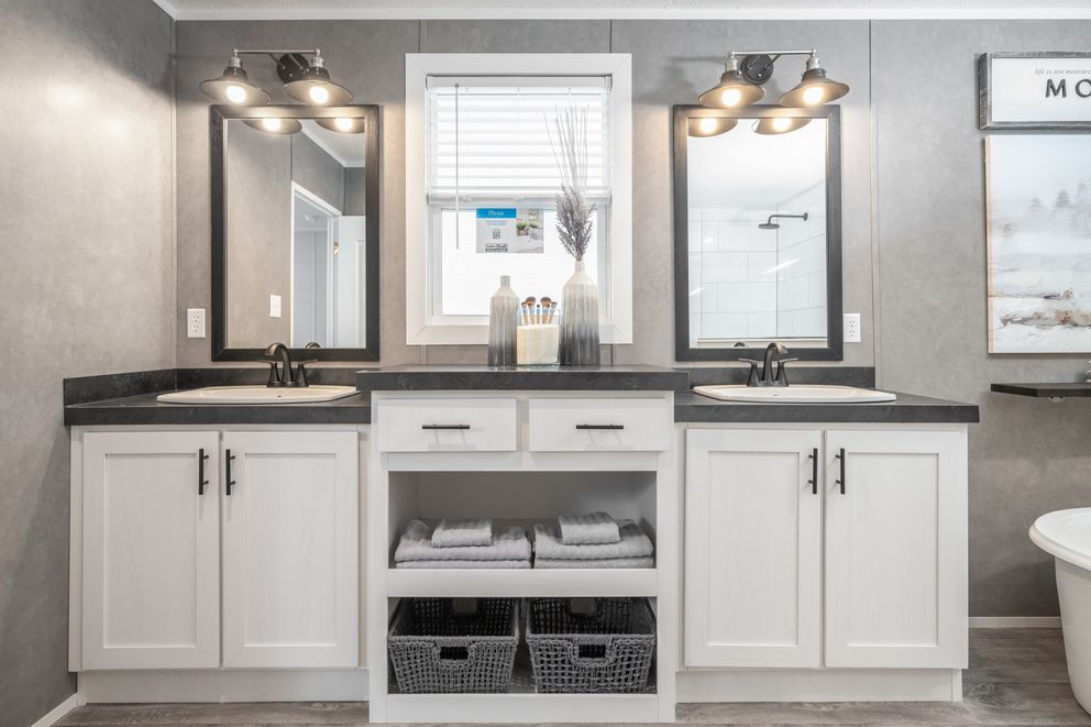 The THE FUSION 3260 Primary Bathroom. This Manufactured Mobile Home features 3 bedrooms and 2 baths.