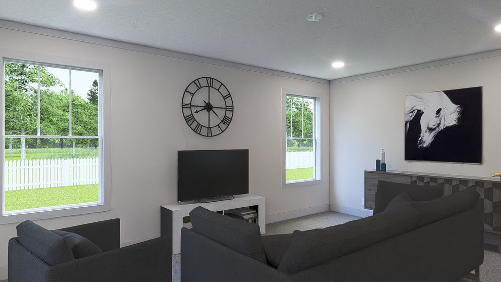 The JOHNNY B GOODE Living Room. This Manufactured Mobile Home features 3 bedrooms and 2 baths.