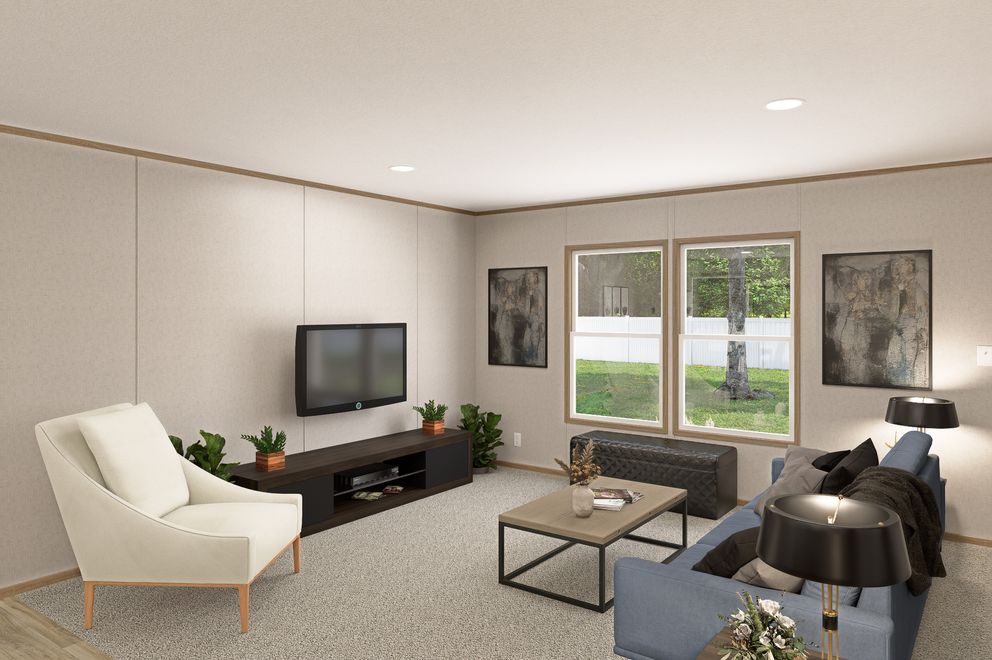 The THE EAGLE 52 Living Room. This Manufactured Mobile Home features 3 bedrooms and 2 baths.