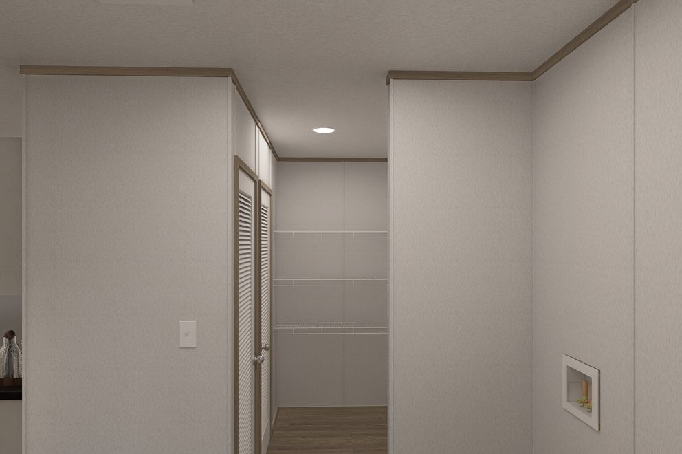 The THE EAGLE 48 Utility Room. This Manufactured Mobile Home features 3 bedrooms and 2 baths.