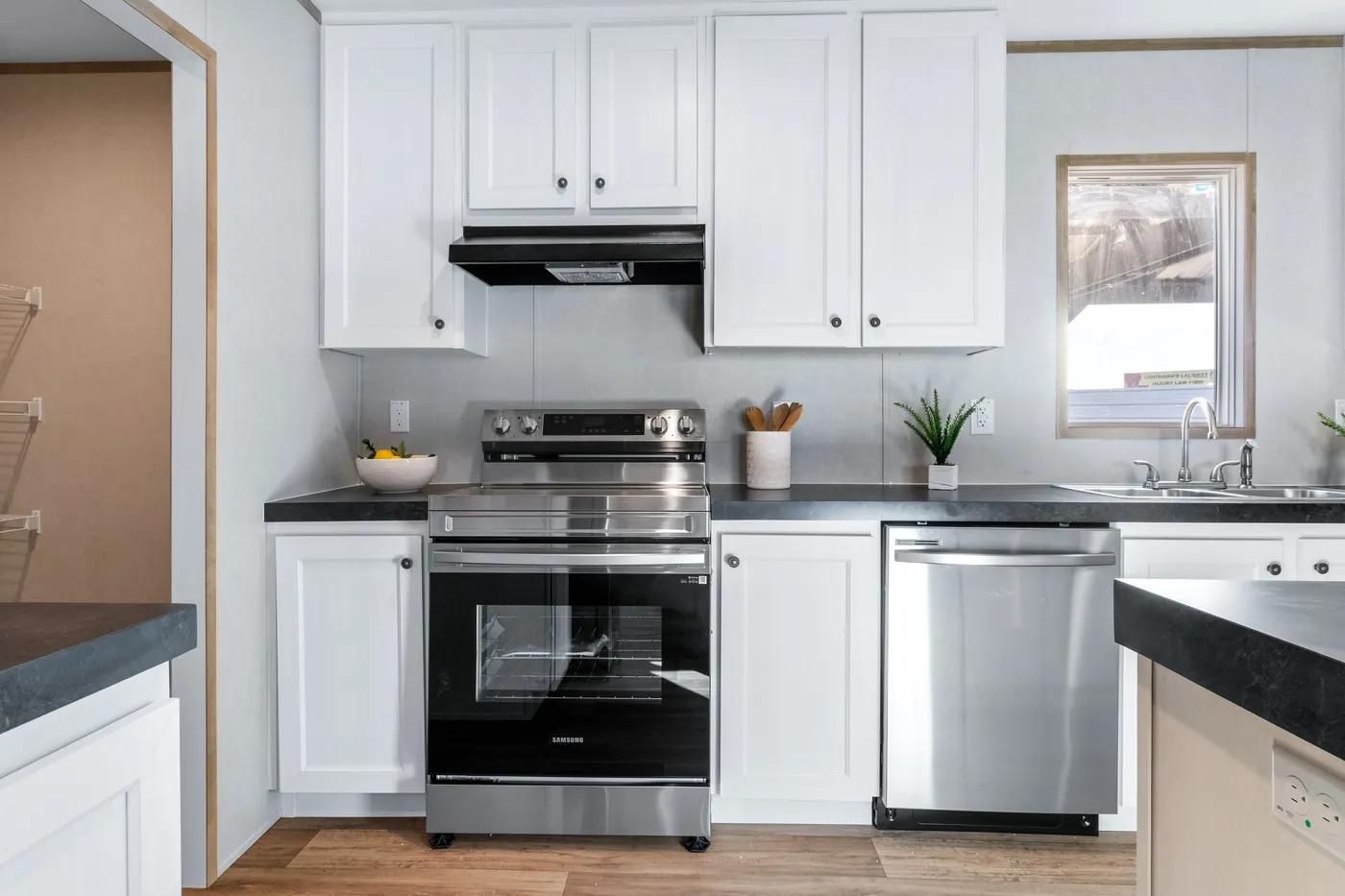 The ASPIRE Kitchen. This Manufactured Mobile Home features 3 bedrooms and 2 baths.