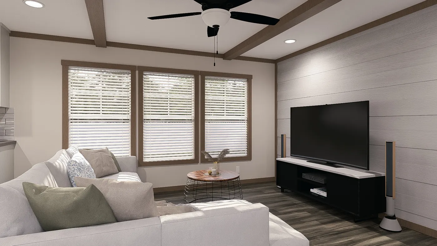 The LEXI Living Room. This Manufactured Mobile Home features 3 bedrooms and 2 baths.