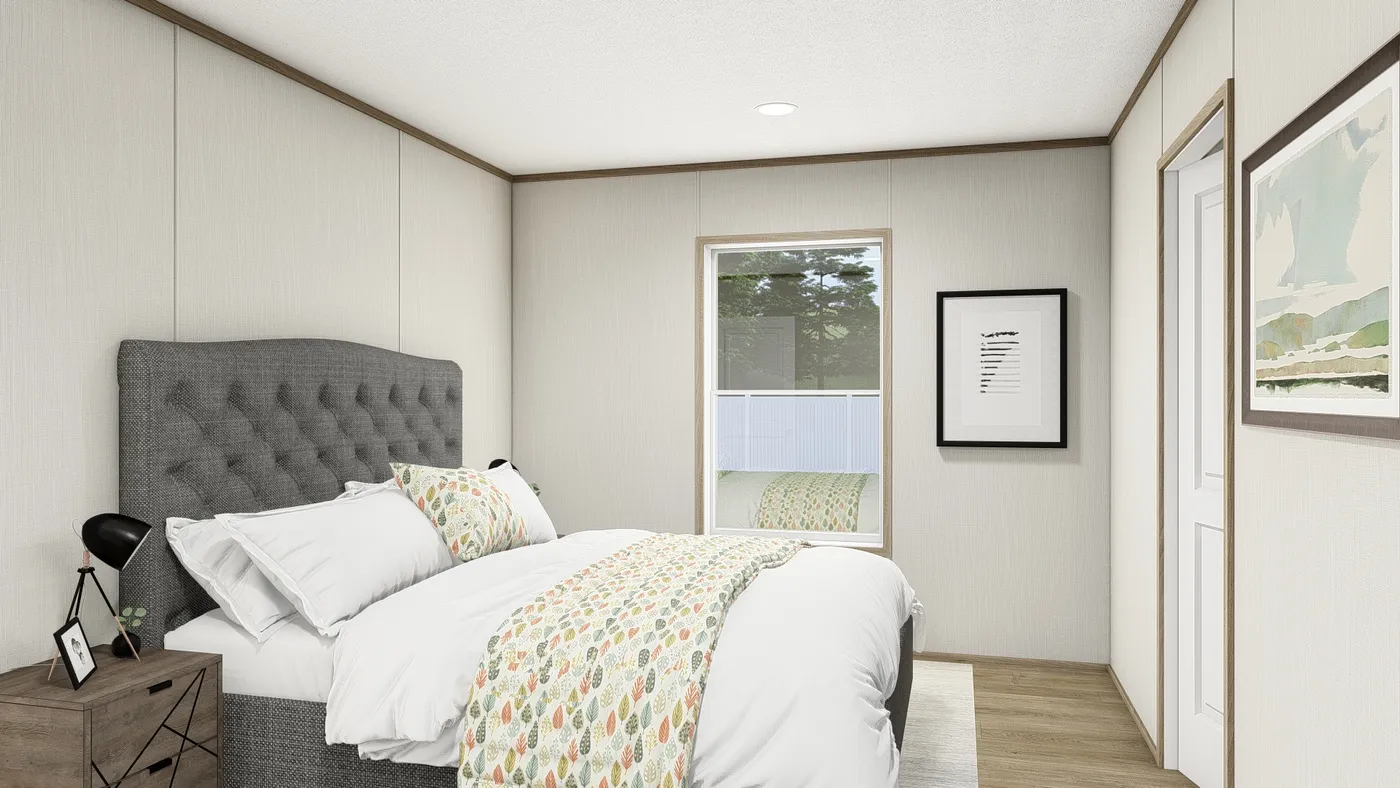 The BEACON Primary Bedroom. This Manufactured Mobile Home features 3 bedrooms and 2 baths.