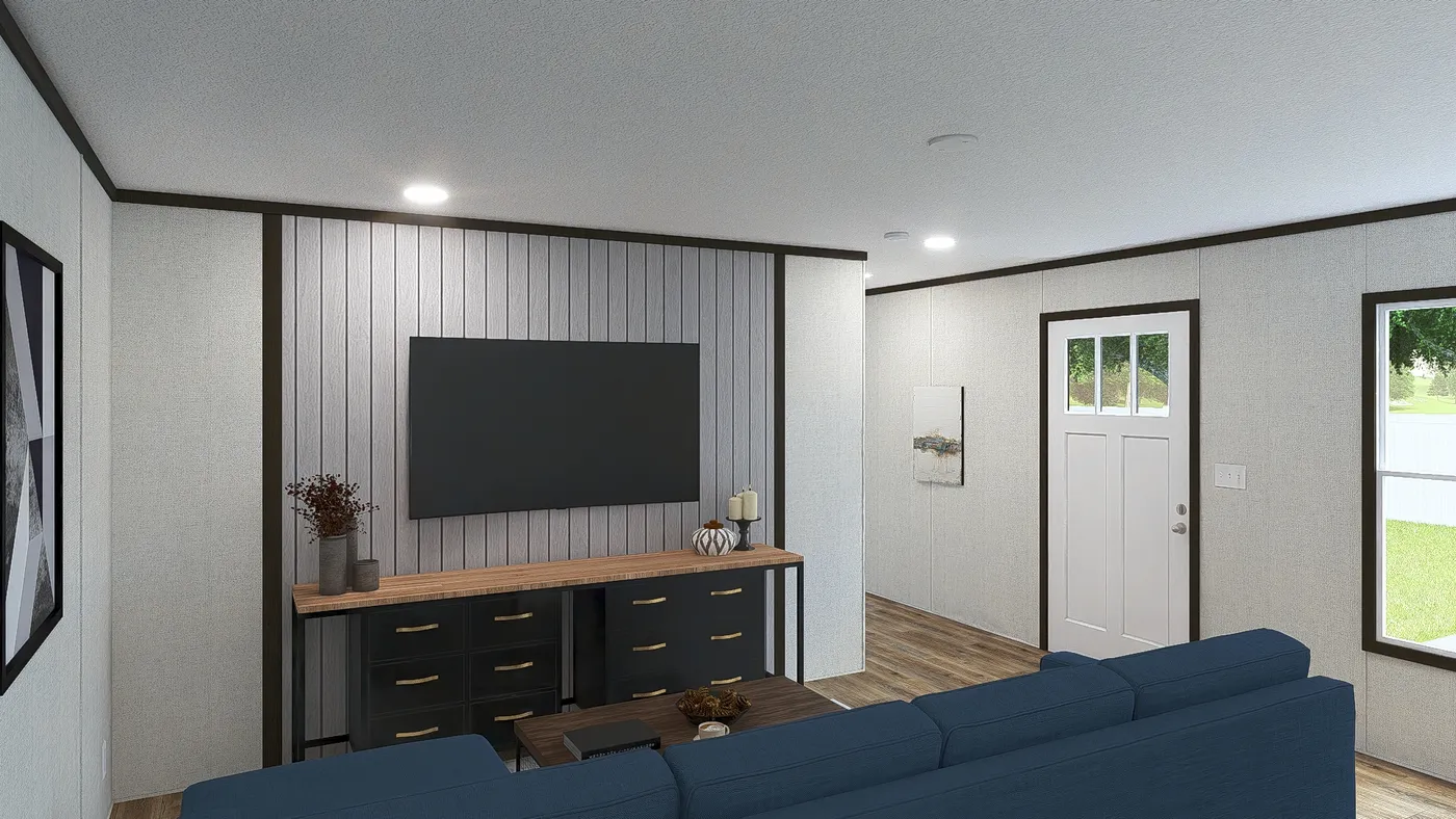 The FESTIVAL Living Room. This Manufactured Mobile Home features 3 bedrooms and 2 baths.