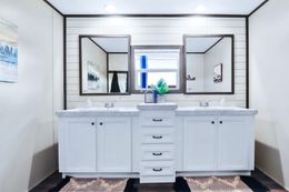 The BREEZE FARMHOUSE Master Bathroom. This Manufactured Mobile Home features 3 bedrooms and 2 baths.