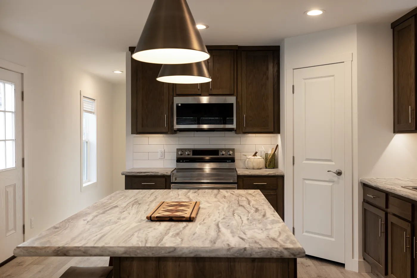 The RAMSEY 217-1 Kitchen. This Manufactured Mobile Home features 3 bedrooms and 2 baths.