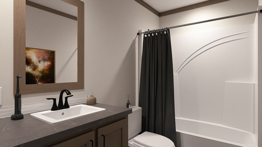 The FARM 4 FLEX ELITE Guest Bathroom. This Manufactured Mobile Home features 4 bedrooms and 3 baths.