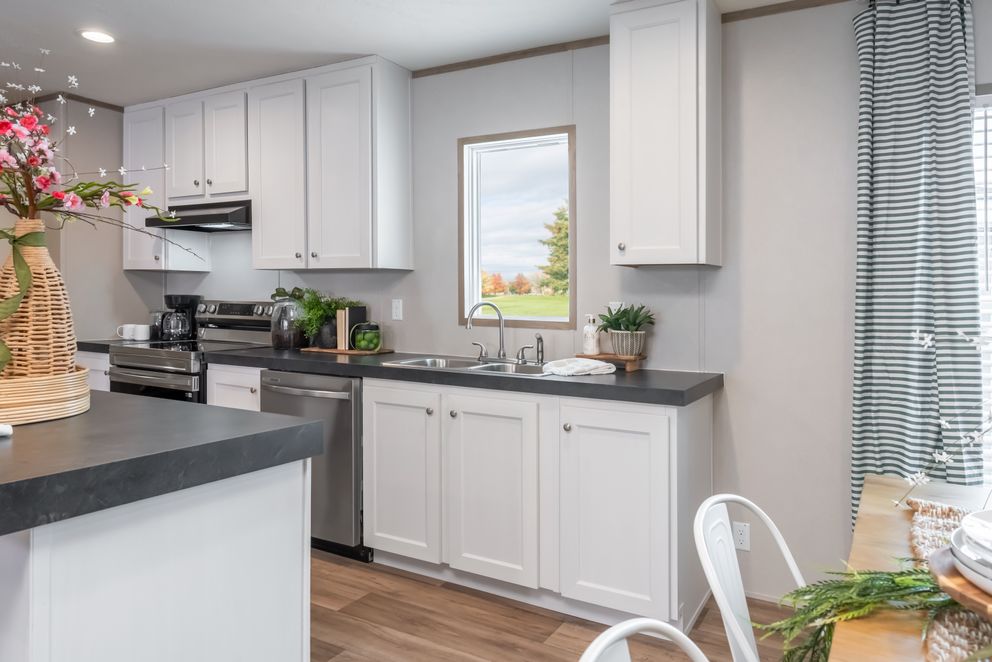 The VISTA Kitchen. This Manufactured Mobile Home features 3 bedrooms and 2 baths.