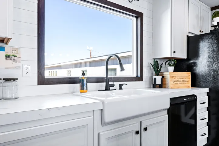 The BREEZE FARMHOUSE Kitchen. This Manufactured Mobile Home features 3 bedrooms and 2 baths.