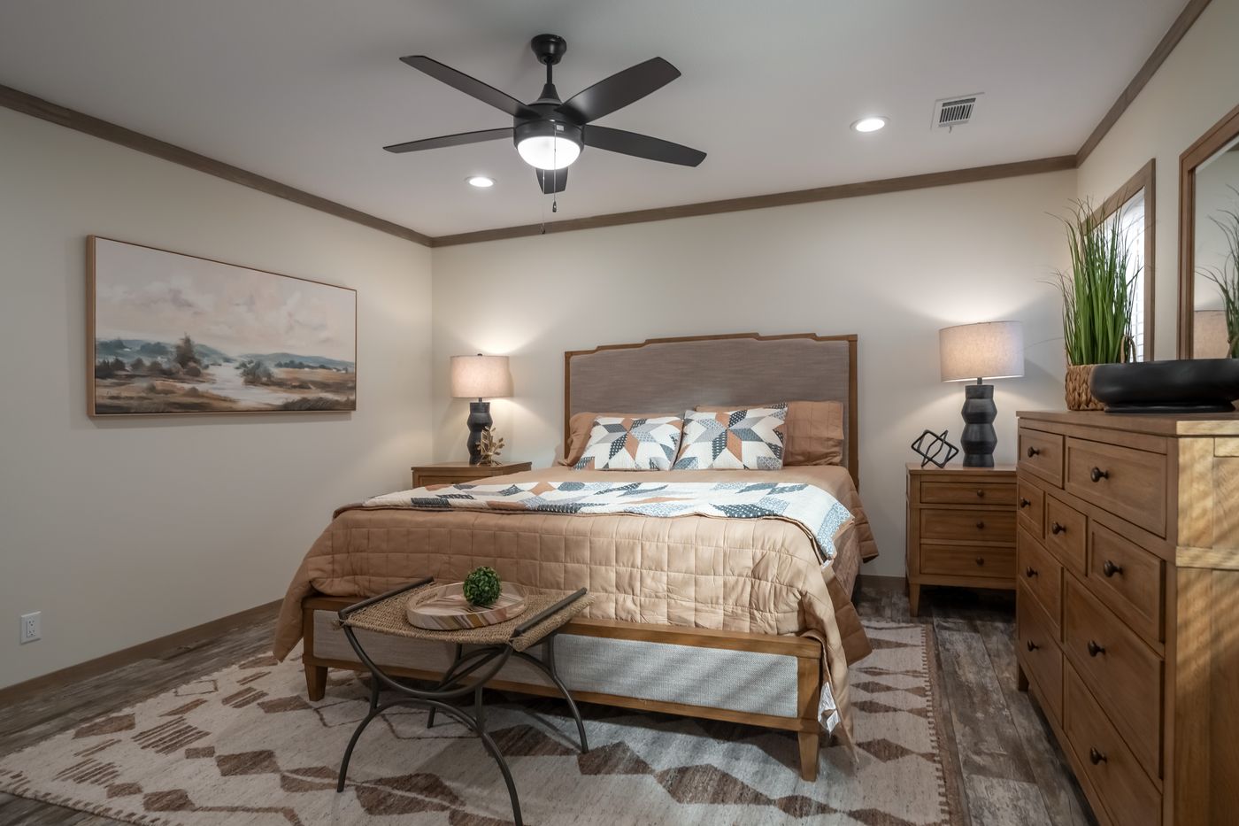 The BOUJEE PREMIER Primary Bedroom. This Manufactured Mobile Home features 4 bedrooms and 2 baths.